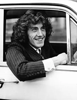 The Who pop group member Roger Daltrey sitting in car The Who pop group member Roger Daltrey sitting in car