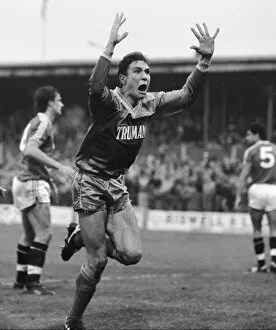 Images Dated 30th November 1986: Wimbledon footballer Vinnie Jones raises his arms as he celebrates scoring the game