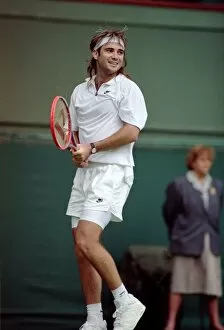 Images Dated 27th June 1991: Wimbledon Tennis. Andre Agassi Training. June 1991 91-4091-219