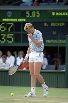 Images Dated 29th June 1989: Wimbledon Tennis. Boris Becker Wearing Banned Shirt. June 1989 89-3895-031