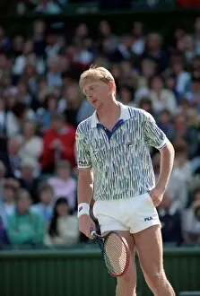 Images Dated 29th June 1989: Wimbledon Tennis. Boris Becker Wearing Banned Shirt. June 1989 89-3895-006