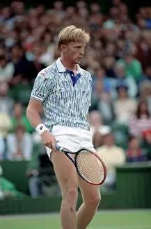 Images Dated 29th June 1989: Wimbledon Tennis. Boris Becker Wearing Banned Shirt. June 1989 89-3895-013