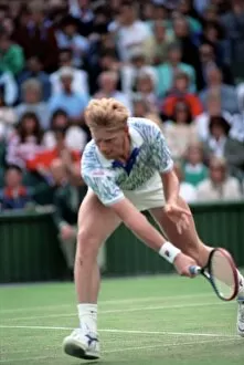 Images Dated 29th June 1989: Wimbledon Tennis. Boris Becker Wearing Banned Shirt. June 1989 89-3895-028
