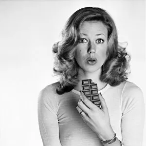 Images Dated 14th February 1975: Woman eating chocolate. February 1975 75-00891
