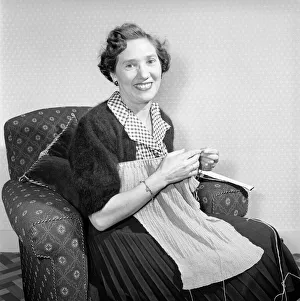 Woman at home knitting. Circa 1955 A119-003 Woman at home knitting. Circa 1955 A119-003