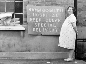 A woman standing at a parking space at Hammersmith Hospital. November 1969 Z11091 A woman standing at a parking space at Hammersmith Hospital. November 1969 Z11091