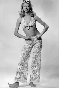 Woman wearing a bikini top and lace see through trousers June 1974 P018056 Woman wearing a bikini top and lace see through trousers June 1974 P018056