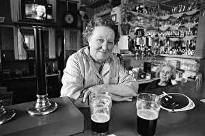 A woman working in a pub in Salford, Manchester, 16th July 1974 A woman working in a pub in Salford, Manchester, 16th July 1974