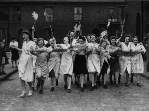 Workers celebrate Victory in Europe Day in Manchester at the end of the Second World War Workers celebrate Victory in Europe Day in Manchester at the end of the Second World War