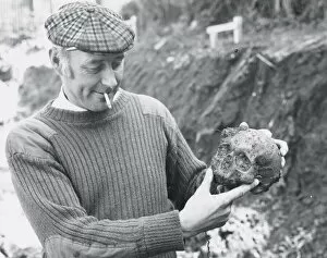Images Dated 1st May 1978: A workman with the skull uncovered when building the new Herald Express office on Barton