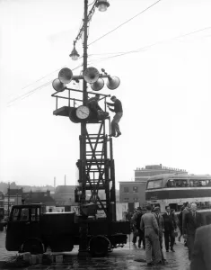 Workmen are erecting the scaffolding for the loud speakers in readiness for Workmen are erecting the scaffolding for the loud speakers in readiness for