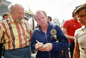 World Cup 1974 Billy Bremner signing autographs after a Scotland training World Cup 1974 Billy Bremner signing autographs after a Scotland training