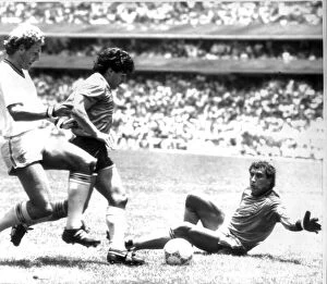 Images Dated 22nd June 1986: World Cup 1986 England 1 Argentina 2 Quarter Finals Maradona scores an