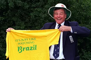 World famous cricket umpire Harold Dickie Bird holding a T-Shirt that barnsley fanswear World famous cricket umpire Harold Dickie Bird holding a T-Shirt that barnsley fanswear
