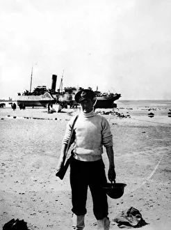 World War Two - Second World War - A naval officer on the beach at Dunkirk prior to World War Two - Second World War - A naval officer on the beach at Dunkirk prior to