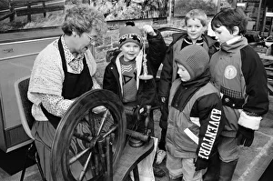 The yarn spinners... Mrs Marie Cooper demonstrates the art of spinning to a group of The yarn spinners... Mrs Marie Cooper demonstrates the art of spinning to a group of