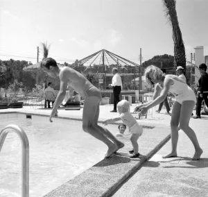 Two year old Gregory Curtis with his mother Jill on holiday in Majorca pushing his dad Two year old Gregory Curtis with his mother Jill on holiday in Majorca pushing his dad