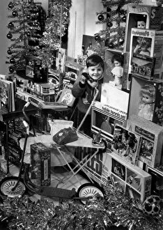Images Dated 23rd November 1970: Young boy surrounded by toys. 23rd November 1970