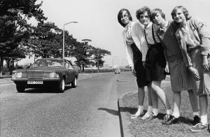 A young girl who ran out of a School into the path of an oncoming car prompted a saftey A young girl who ran out of a School into the path of an oncoming car prompted a saftey