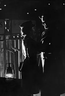 A young wartime couple say their goodbyes at the station as he returns to his army unit A young wartime couple say their goodbyes at the station as he returns to his army unit