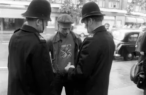 Youth Culture, punk rockers on the street clash with the police Youth Culture, punk rockers on the street clash with the police