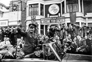 Yuri Gagarin July 1961 Russian Spaceman waves from a car outside headquaters of Yuri Gagarin July 1961 Russian Spaceman waves from a car outside headquaters of
