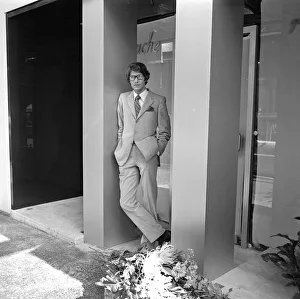 Yves St. Laurent pictured outside his new boutique in the Rue de Tournon on the left bank Yves St. Laurent pictured outside his new boutique in the Rue de Tournon on the left bank