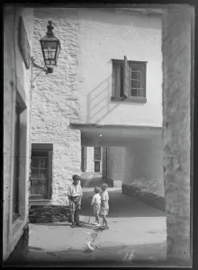 Children Prints: Lower Chapel St, East Looe Children playing hoop Print