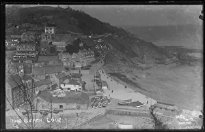 East Looe Beach & seafront with washing drying on East Cliff East Looe Beach & seafront with washing drying on East Cliff
