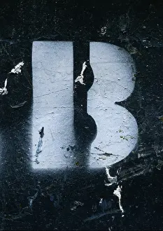 B stencil print with text