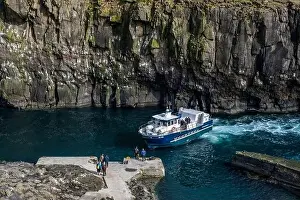 Ferry Print on Dramatic Cliffs