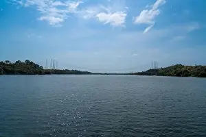 High Voltage Lines Print over Xingu River near Belo Monte Hydro Plant