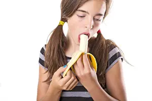 Teenage girl with banana in mouth print