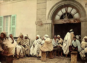 Arabs in front of a caf in Algiers