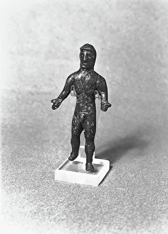 Framed Print : Bronze statuette. Archaeological artifact found in Cir Marina at the Sanctuary of Apollo Apheus and conserved at the National Museum in Reggio Calabria (Calabria)