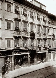 Commercial Building Structure Prints: Faade of a building with store-fronts