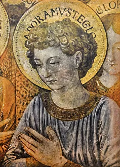 Face of an angel. Detail of the Adoring Angels from the right, fresco by Benozzo Gozzoli in the Chapel of the Magi, Palazzo Medici-Riccardi, Florence
