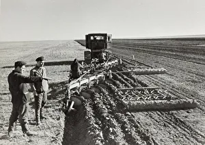 Rural Landscape Photos Prints: A field is mechanically cleared