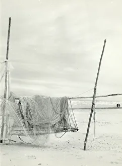 Fishing nets spread out on the beach