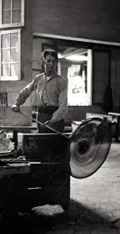 Glass blower at work in a studio in Murano