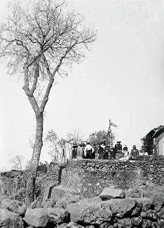Group of people around a well