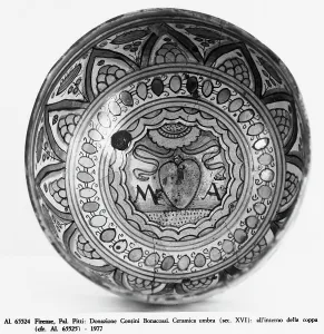 Initials on the inside of a cup: Umbrian ceramic piece, part of the Contini Bonacossi Collection, in the Palazzo Pitti, Florence