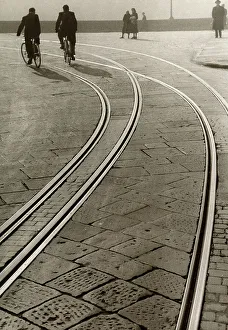Two men on bicycles