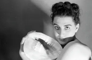 Female Model Photography Prints: Model posing with a shell