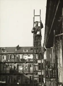 Painter on a work scaffold
