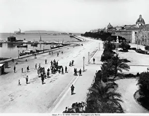 Italian Urban Landscape Prints: People strolling along the seafront of Trapani