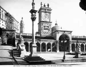 The portico of S. Giovanni, the Clock Tower and, in the background, the bell tower of the Church of S. Maria di Castello, Udine