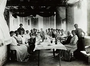 Portrait of a group sitting at table