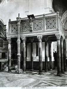 Romanesque ambo and Easter candelabrum leaning on it