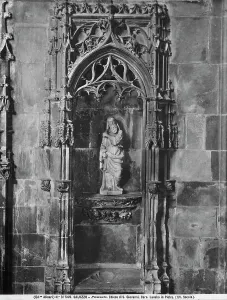Stone basin with statue of prophet, work of Lombard artist situated in the chapel of Saint Sepulchre in the Saint John church at Saluzzo, Cuneo